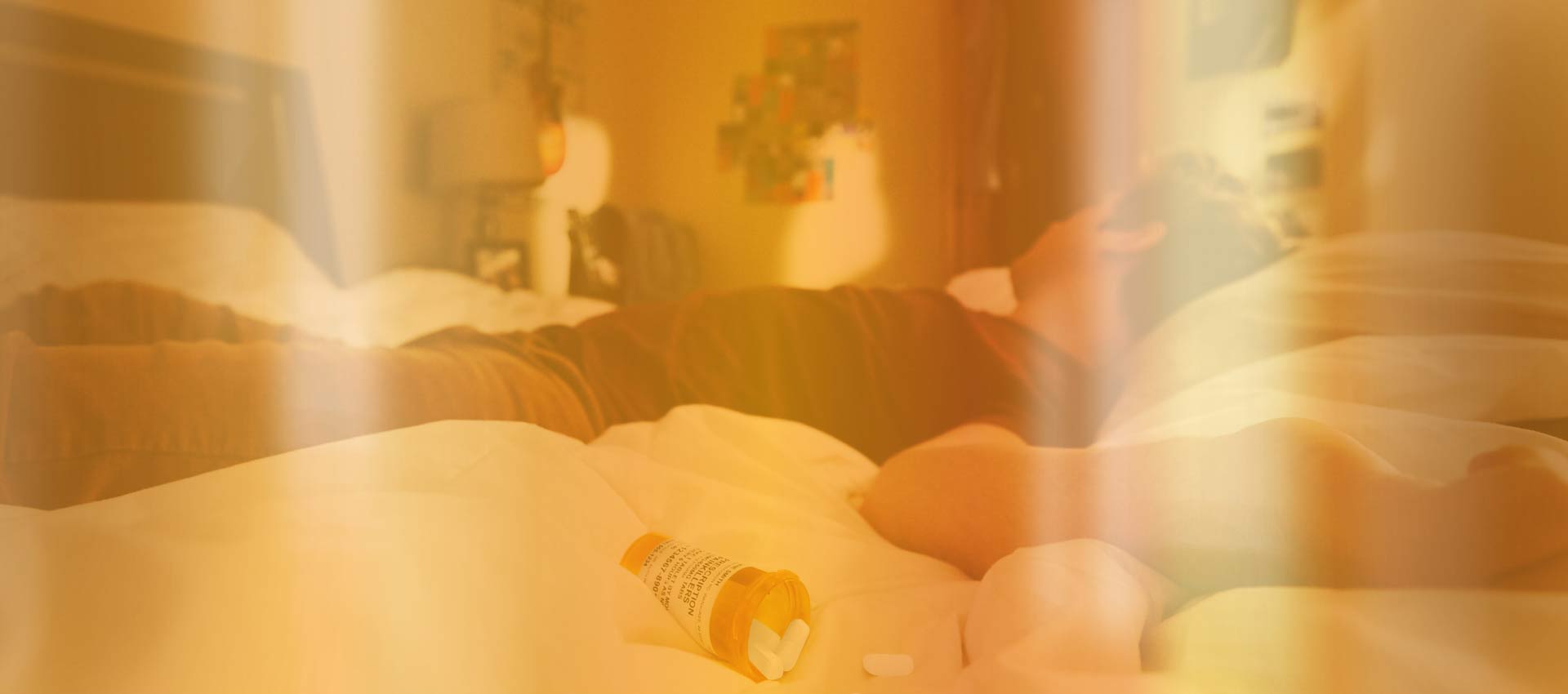 Young man on bed after overdose